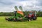 Russia, Leningrad Region - June, 2019: Powerful tractor brand Kirovets and Amazon brand seed drill at the exhibition