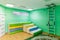 Russia, Moscow, 02.01.2019: Rest in a public kindergarten. Many beds in the bedroom. Empty room with green walls