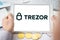 Russia Moscow 06.05.2021.Tablet with logo of Trezor hardware pocket wallet. Safe, secure vault for cryptocurrency,coins,tokens,nft
