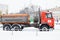 Russia Moscow 13.02.2021 Truck of street cleaners. Cleaning snow from road,sidewalk. Tractor,snow removal car,equipment