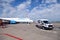 Russia Moscow 2019-06-17 Ford ambulance car on the background of the airport runway, large wide body passenger aircraft Boeing 737