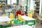 Russia Moscow 25.09.20 Children`s city library. Special reading room for kids with bright green, red, yellow tables, chairs. Many