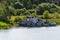 Russia, Moscow region, August 2108. The old boat stopped by the river in the summer