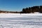 Russia, Moscow region, Grebnevo 08 February, 2020: Ice skaters. Barsky pond Rink. Winter sunny day