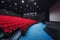 Russia, Nizhny Novgorod - may 29, 2014: October Cinema. Empty red cinema hall seats, comfortable and soft chairs