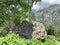 Russia, North Ossetia. Tsey gorge, memorial stone near the road to the  glacier `fairy Tale` in summer