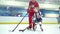 Russia, Novosibirsk, 2017: he coach on the ice gives juniors exercise.