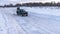 Russia, Novosibirsk-January 20, 2020 Two Russian SUV `Lada Niva` quickly go on a snowy road in the field in the winter, clinging t