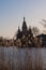 Russia, Peterhof, Holgin pond in the spring. Early spring. Peter and Paul Cathedral. Contrasting sun. Graphics