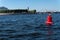 RUSSIA, PETERSBURG - AUG 20, 2022: buoy red waves ocean float bay object nature russian, from isaac street in cityscape