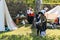 Russia, Priozersk, August 2020. Camp of reenactors dressed as musketeers at the walls of the old fortress.