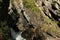 Russia, Republic of Buryatia, the waterfall in the upper reaches of Kyngarga river, in the rocks of the mountains of Eastern Sayan