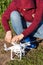 RUSSIA, ROSTOV-ON-DON - APRIL 20, 2017: quadrocopter flight preparation, installing propellers by male hands, assembly