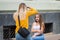 Russia, Rostov on Don, September 09, 2018: Two beauty womens make a photo session on street