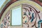 Russia, Rostov, July 2020. Fragment of the painting above the door of the old church.