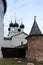 Russia, Rostov, July 2020. Tower of the fortress wall and domes of the Orthodox Cathedral.