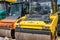 RUSSIA, SAINT-PETERSBURG - JUNE 12, 2019: Two asphalt pavers. Heavy equipment for repair of roads