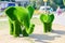 Russia Saratov region August 28, 2018: sculptures green elephants from the lawn