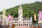 RUSSIA, SOCHI - MAY 25, 2018: Rosa Khutor resort, chapel building on a background of mountains and trees