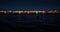 Russia, St. Petersburg, 07 August 2022: A few sailboats with sails illuminated in the tricolor of Russia go in the city