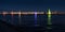 Russia, St. Petersburg, 07 August 2022: A few sailboats with sails illuminated in the tricolor of Russia go in the city