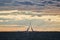 Russia, St. Petersburg, 23 July 2021: Competition of two sailboats on the horizon in sea at sunset, the amazing storm