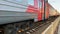 Russia, St.Petersburg, 25 April 2020: The passenger electric train of the Russian Railway company RZD approaches to