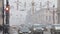 Russia, St Petersburg, 30 December 2023: The heavy snowfall on the streets decorated for Christmas, traffic from