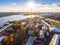 Russia, St. Petersburg, Aerial landscape of Peter and Paul cathedral at sunset, walls of fortress, Golden autumn