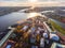 Russia, St. Petersburg, Aerial landscape of Peter and Paul cathedral at sunset, walls of fortress, Golden autumn