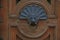 Russia, St. Petersburg, architectural details, an element of a wooden door, a metal handle in the form of a lion