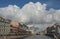 Russia, St. Petersburg, Moika River in summer. Contrasting architecture, incredible huge cumulus clouds in the sky. The famous Blu