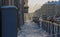 Russia, St. Petersburg, a narrow winter street, characteristic of St. Petersburg. A lot of snow, snow removal from the roofs of ho