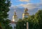 Russia, St. Petersburg, St. Nicholas Cathedral, golden domes, emotional urban landscape, bright sun before a thunderstorm, water b