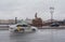 Russia, St. Petersburg in the summer in the rain. A rainy gray cloudy city. View of the sights. University Embankment. Sculpture o