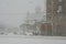 Russia, St. Petersburg, winter. Winter city street, snowfall, snow. Snow-covered building close-up. Astoria Hotel. Very heavy snow