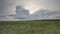 Russia, timelapse. The movement of the thunderclouds over the fields of winter wheat in early spring in the vast steppes of the Do