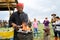 Russia, Tyumen, 15.06.2019. Blacksmith holds a master class on forging at the festival of different Nations. Heats the iron on the