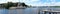 Russia, Uglich, July 2020. Panorama of the Volga river and buildings of the city center.