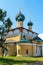 Russia, Uglich, July 2020.  View of the old Orthodox cathedral on the river bank in the city center.