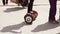 Russia, Urypinsk, 05 01 2017. Girl rolls on gyroscope down the street in a sunny day