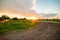 Russia village sunset spring bright sun road poles and wires