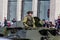 Russia, Vladivostok, 05/09/2018. Soldier in combat uniform riding military vehicle on the parade on Victory Day on May`9. Holiday