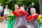 Russia, Vladivostok, 06/12/2018. Adorable actresses weared in traditional Russian Slavic clothes perform on stage on annual