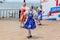 Russia, Vladivostok, 06/12/2018. Adorable actresses weared in traditional Russian Slavic clothes perform on stage on annual