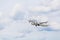 Russia, Vladivostok, 08/17/2020. Passenger plane Sukhoi Superjet 100 SSJ 100-95B of IrAero company in a sky. Russian airlines