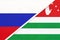 Russia vs Abkhazia national flag from textile. Relationship and partnership between two countries