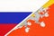 Russia vs Kingdom of Bhutan national flag from textile. Relationship and partnership between two countries