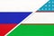 Russia vs Uzbekistan national flag from textile. Relationship and partnership between two countries