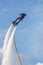 Russia. Vyborg. 05.09.2020. A man flies on a FlyBoard. vertical frame